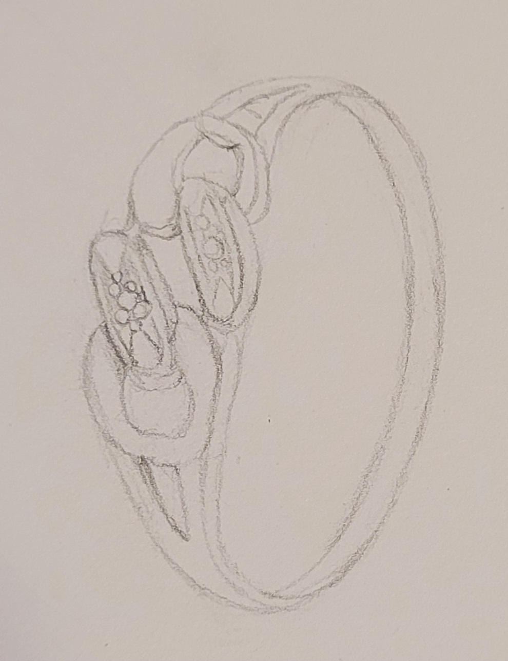 Une bague dessinée sur papier